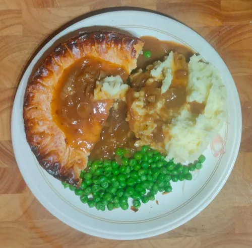 Pie and mash with peas and gravy