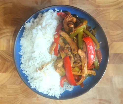 Pork with peppers and rice