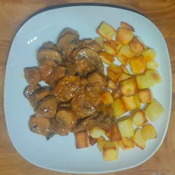 Pork with cream and mushrooms